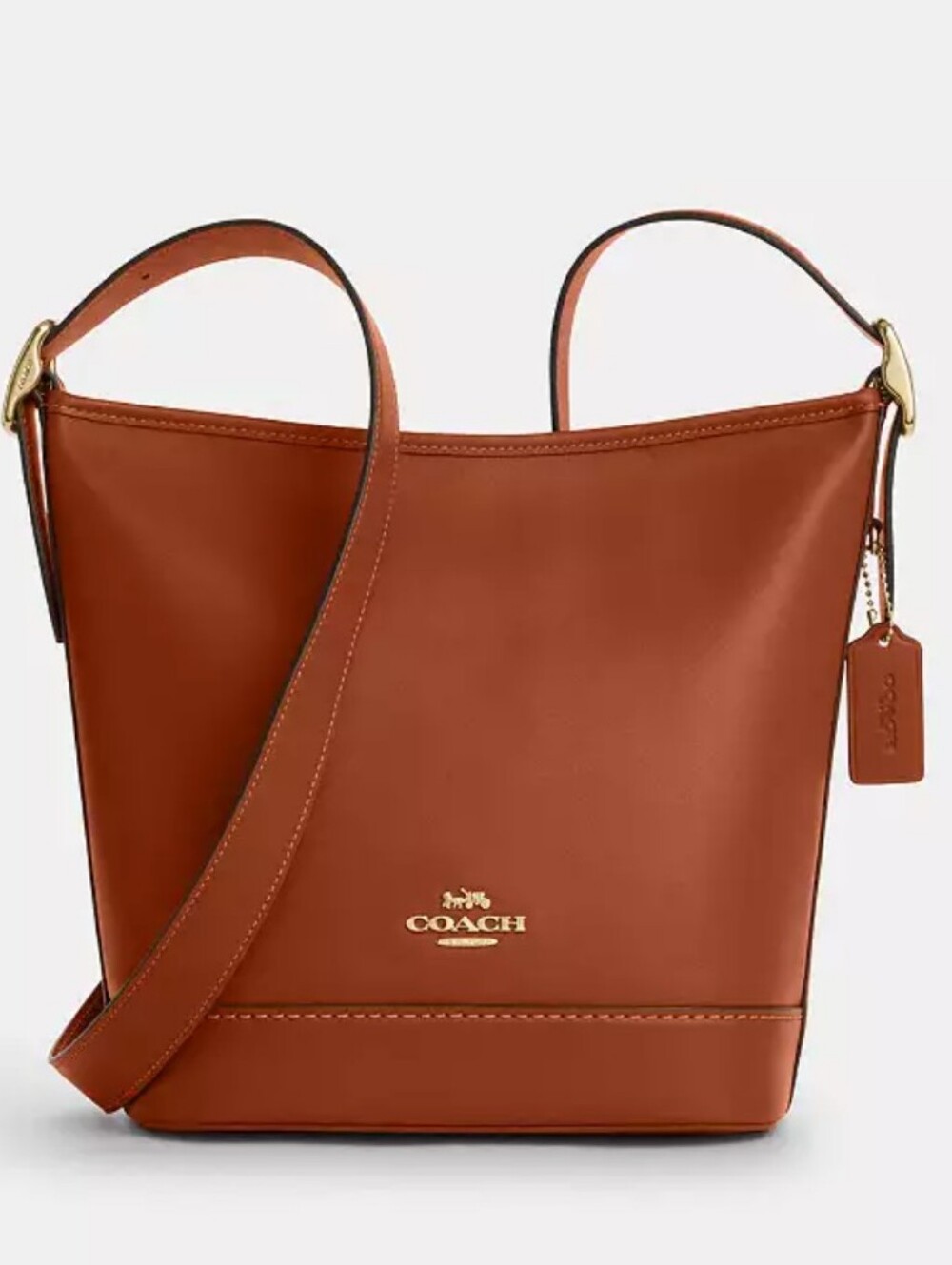 Coach Jude Duffle Bag in tan leather featuring gold-tone hardware